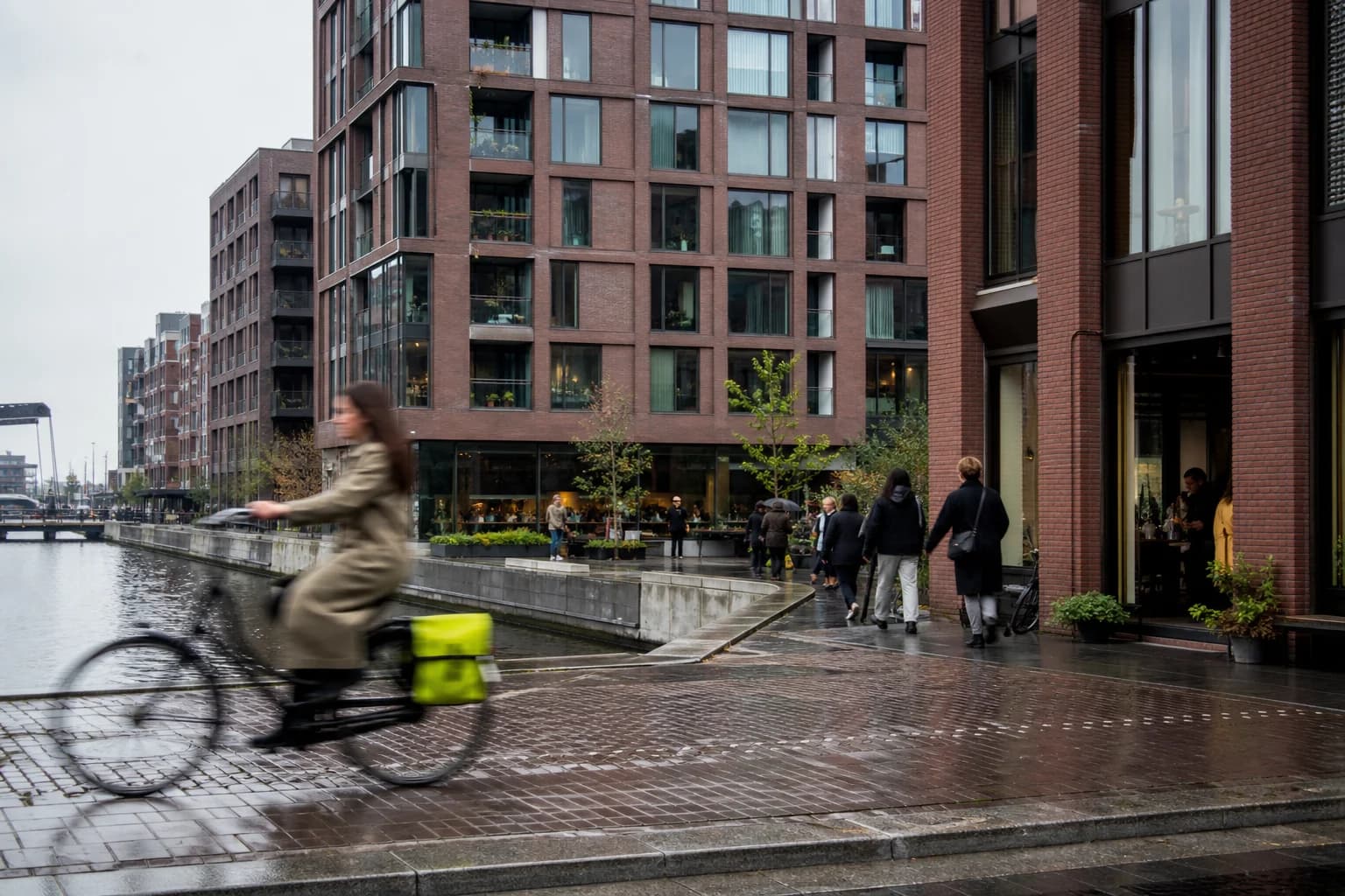 Contemporary business and urban life around a canal in the Netherlands